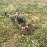 pokladanie mínového poľa