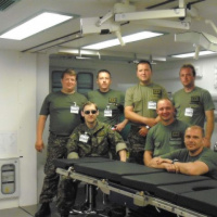 Účastníci expozície ÚHL Ružomberok na MEDIPHARM 2011 zľava: nrtm. M. TEKEĽ, por. MUDr. M. UČEŇ, des. M. KUŠION, des. M. MOLČAN, des. M. TKÁČ, des. J. GAJDOŠ, čat. S. HORNIAK